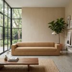 Scandinavian Elegance Leather Upholstered Three-Seater Sofa - Caramel Brown